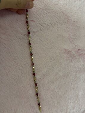 Vintage yellow gold tennis link bracelet with ruby gemstones